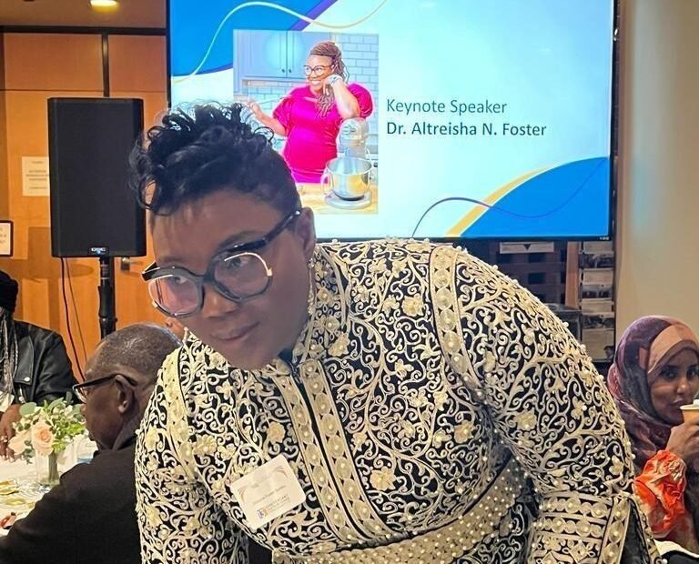 Dr. Foster at a keynote event